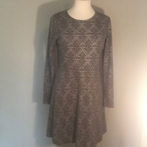Fully lined Kenzie dress with geometric designs.